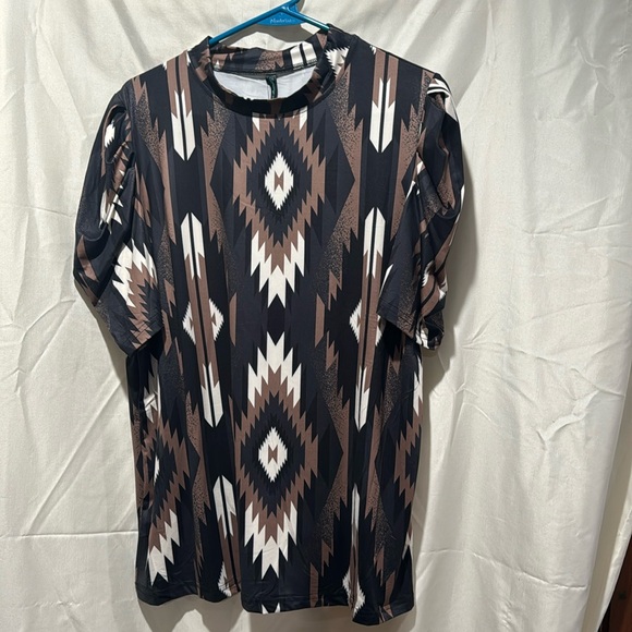 a high neck line and uniquely designed bubble sleeves
94% Polyester 6% Spandex - Picture 2 of 4